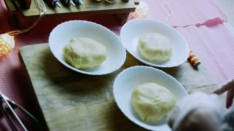 Elegant kitchen sequence of prepared round cookies ready for filling Stock Photos