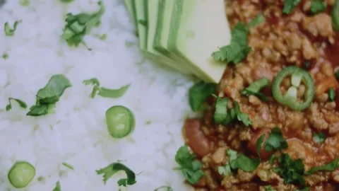 Elegant kitchen study of restaurant-style chili con carne beauty shot Stock Footage 342153567