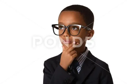 Elegant little boy with glasses in business suit. Studio shot. Isolated Stock Photos