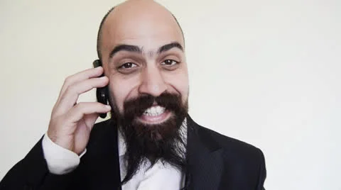 Elegant long bearded blad man on the phone Stock Footage 23908575
