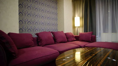 Elegant Lounge Area With Sofa and Chairs in a Luxurious Setting Stock-Footage 307833478