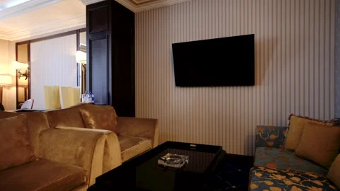 Elegant Lounge Area With Sofa and Chairs in a Luxurious Setting Stock-Footage 307834404