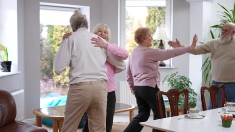 Elegant loving old man asking woman for a dance indoors. Positive smiling Stock Footage 240609727