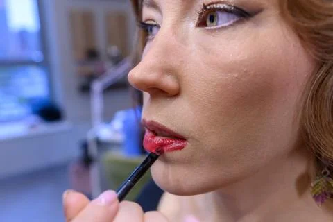 Elegant makeup application captures the essence of beauty in a salon Stock Photos