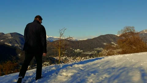 Elegant Man Using Smartphone and Making Photos and Joy Mountain View Stock Footage 194011766