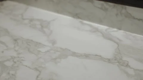 An Elegant Marble Surface that Boasts Subtle Veining, Perfect for Any Luxury Video stock 282093656