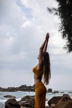 An Elegant Model Gracefully Posing Amid Nature by the Beautiful and Peaceful Stock Photos