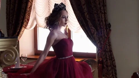 Elegant model leaning on sofa 스톡 동영상 79004807