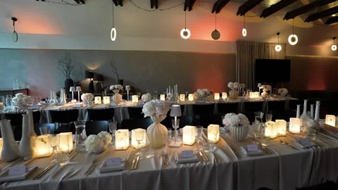 Elegant Modern Candlelit Table Setting for Evening Event Reception Stock Footage 337434940