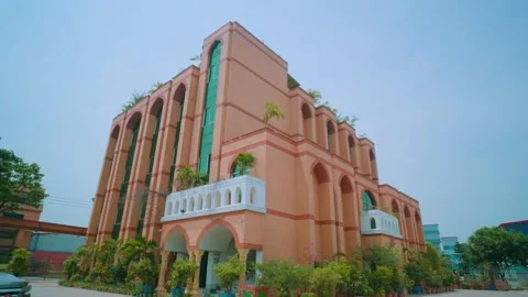 Elegant Mosque Beneath Bright Blue Sky | Iconic Religious Architecture Stock Footage 314676531