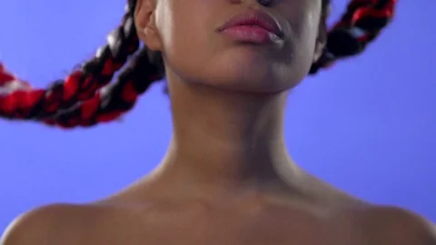 Elegant neck with plump lips of a swarthy young woman. Stock Footage 77583085