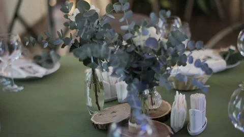 Elegant outdoor table setting with glassware and sunlight Stock Footage 312829762