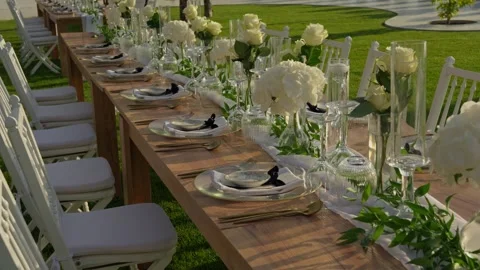 Elegant Outdoor Wedding Table Set With White Roses And Gold Plates Stock-Footage 340595611