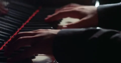 An Elegant Piano Hand Posing Gracefully in Soft and Warm Evening Light with Stock Footage 285647397