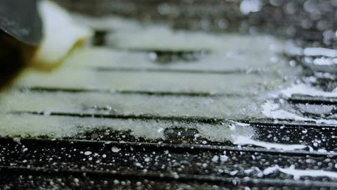 Elegant recipe ingredient view: cracking eggs into the tomato mixture 스톡 사진