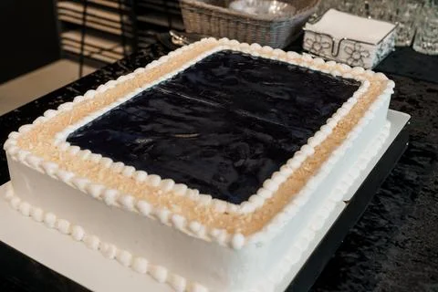 Elegant Rectangular Cake with Blue Frosting and Delicate White Piping Details Stock Photos