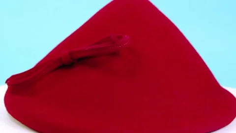 Elegant red bonnet with bow 1950s Stock Footage 314329304