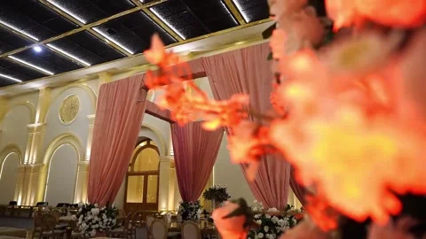 Elegant Restaurant Interior with Pink Drapes and Floral Table Decoration for Din Stock Footage 343618650