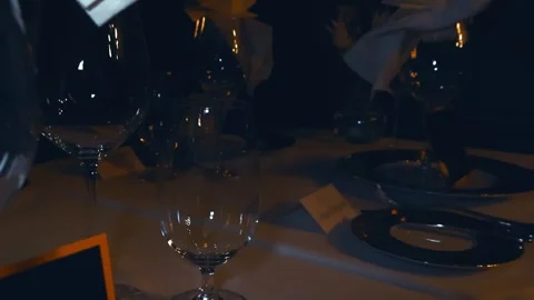 Elegant Restaurant Table Setting With Shiny Wine Glasses Stock Footage 334404883
