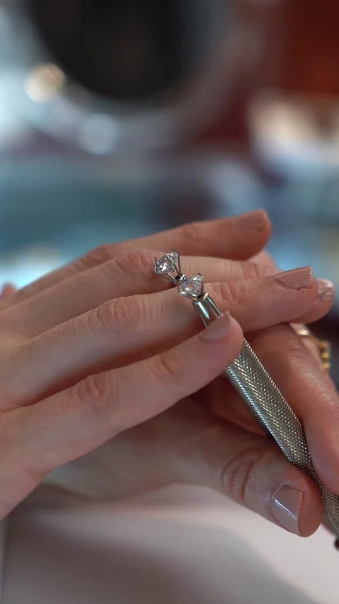 An Elegant Ring Showcase Featuring a Stunning Diamond Setting in its Design and Stock Footage 314575269