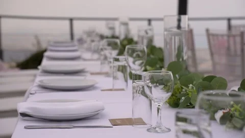 Elegant rooftop dining setup with stunning views for an unforgettable gathering Stock Footage 321386928