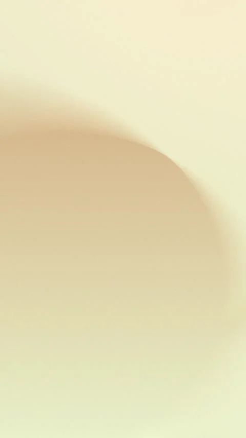 Elegant seamless loop background with soft grainy beige gradient. 4K. Stock Footage 309856164