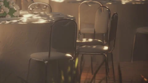 Elegant Setting of Tables and Chairs in Soft Natural Light Stock Footage 344954152