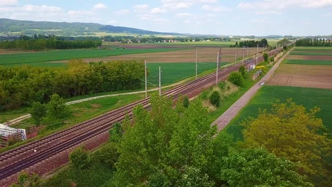 Elegant shot of freight train passing with decent drone movement 4k Stock Footage 108590248
