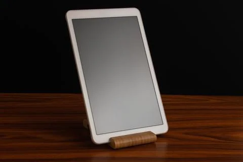 Elegant smart home control panel on a wooden base combining advanced technolo Stock Photos