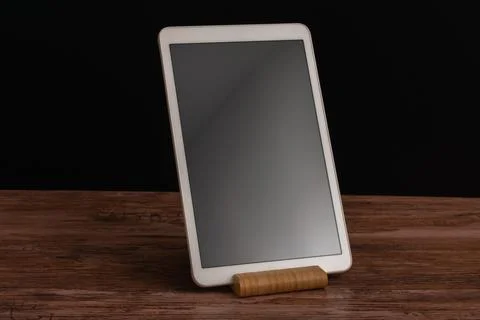 Elegant smart home control panel on a wooden base combining advanced technolo Stock Photos