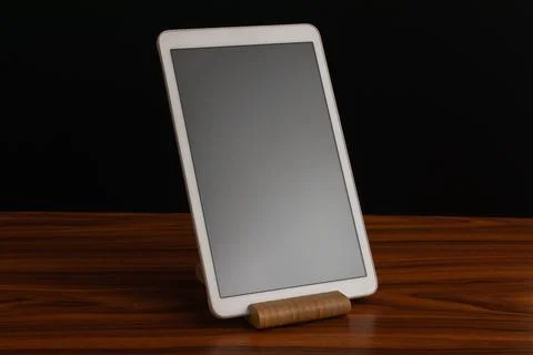 Elegant smart home control panel on a wooden base combining advanced technolo Stock Photos