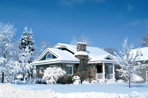 Elegant Snow-covered Stone House in Boyne City Stock Photos