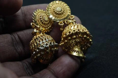 Elegant solid yellow and silver gold rings, necklaces, and more crafted Stock Photos
