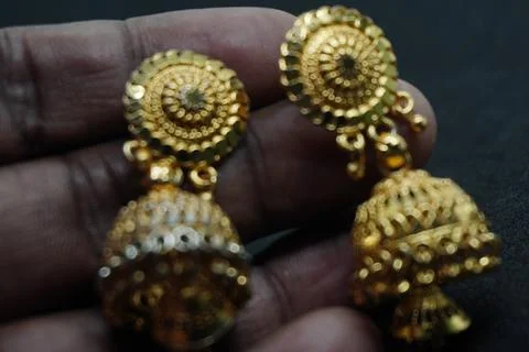Elegant solid yellow and silver gold rings, necklaces, and more crafted Stock Photos