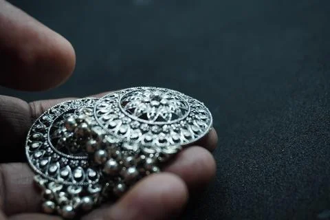 Elegant solid yellow and silver gold rings, necklaces, and more crafted Stock Photos