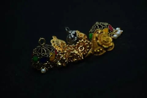 Elegant solid yellow and silver gold rings, necklaces, and more crafted Stock Photos