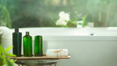 Elegant Spa Bathroom Setting with Greenery Stockbeeldmateriaal 332451526
