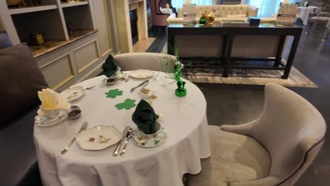 Elegant St. Patrick's Day Table Setting in a Luxury Dining Room Stock Footage 332177346