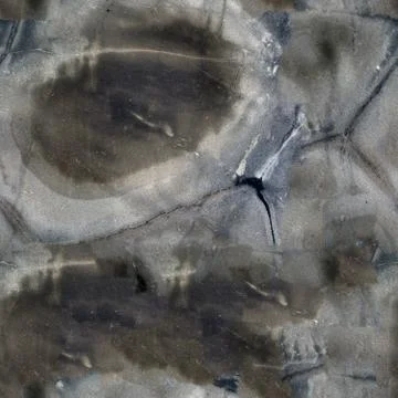 Elegant stone quartzite with a pattern of dark brown. Seamless square background Stock Photos