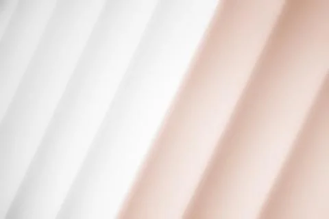 Elegant striped bronze background pattern fading into white space Stock Photos