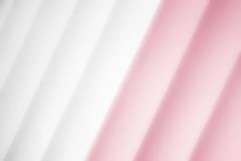 Elegant striped maroon background pattern fading into white space Stock Photos
