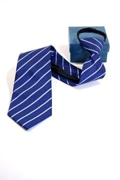 Elegant stripped pattern blue tie and gift box Stock Photos
