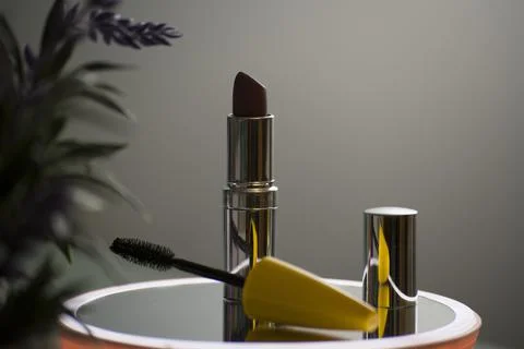 Elegant stylish view of basic makeup tools lipstick and mascara Stock Photos