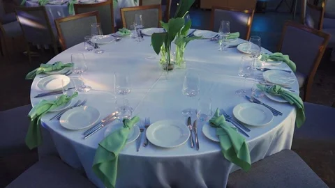 Elegant, stylishly set table in restaurant for celebration. Event. Decorated Stock Footage 312768155