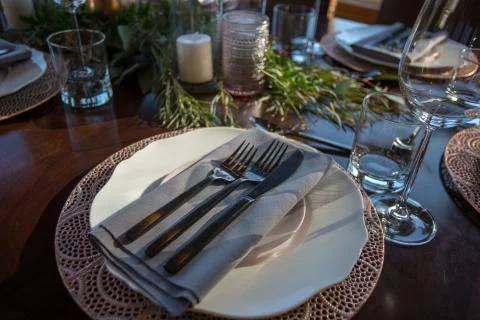 Elegant Table set with focus on a dinner plate. Stock Photos