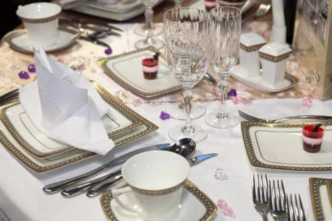 Elegant table set for a wedding dinner Stock Photos