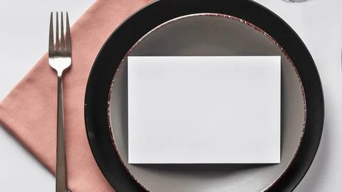 Elegant table setting with blank card and rose gold fork Stock Photos