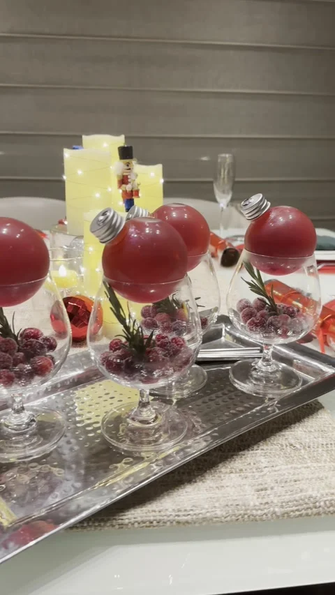 Elegant table setting with candles and berries for a perfect dinner ambiance Stock Footage 318045053
