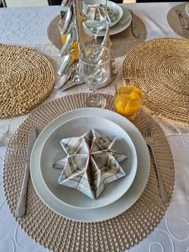 An Elegant Table Setting Enhanced by Creative and Unique Napkin Folding Stock Photos