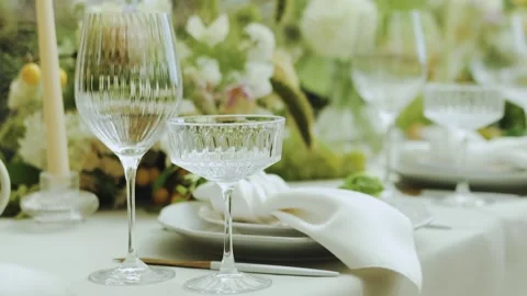 An Elegant Table Setting Featuring Exquisite Crystal Glassware and Beautiful Video stock 308397557